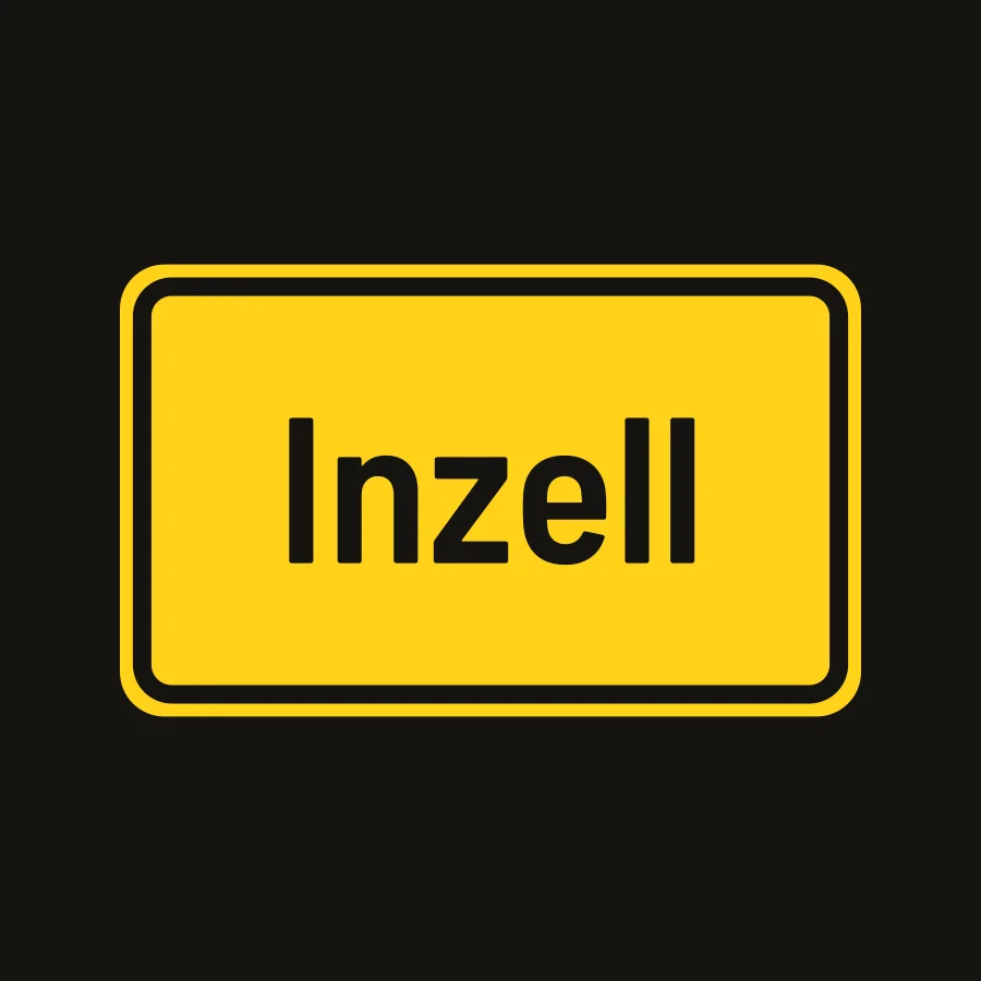 Shirt-Motiv: gelbes Ortsschild mit dem Namen Inzell auf schwarzem Stoff